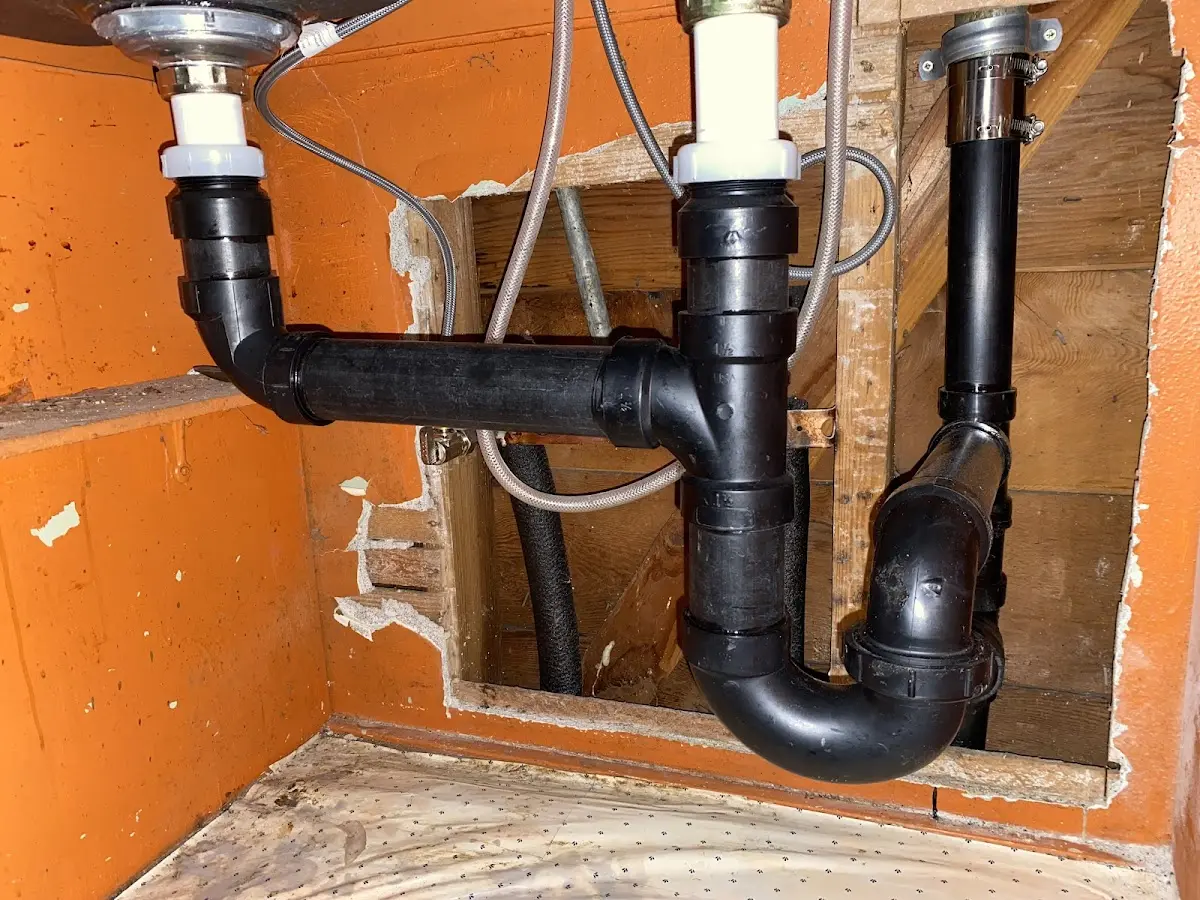 Professional Garbage Disposal Repair equipment and tools on the job in Dyer
